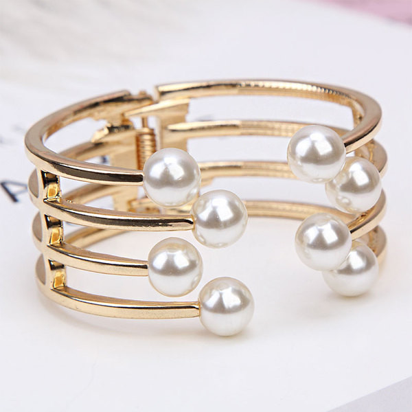 Γυναικείο βραχιόλι με πέρλες σε χρυσό και ασημί χρώμα