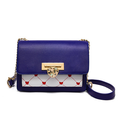 Κομψή γυναικεία τσάντα με κεντήματα και μεταλλικό στοιχείο σε τρία χρώματα