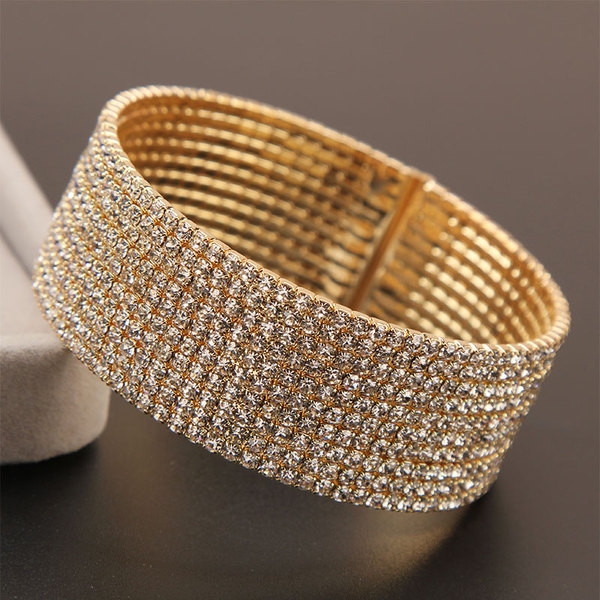 Κομψό γυναικείο βραχιόλι με πέτρες σε δύο χρώματα 