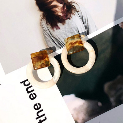 Κομψά γυναικεία σκουλαρίκια στρογγυλά  σε τρία χρώματα