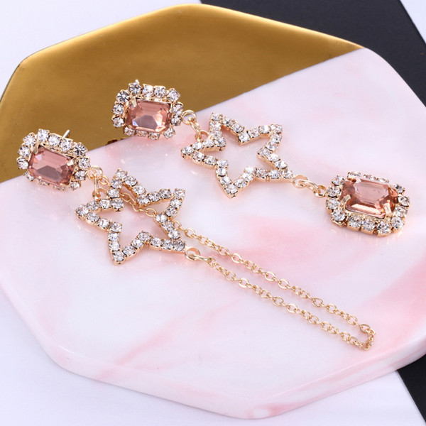 Modern női fülbevaló kövekkel, rózsaszínben