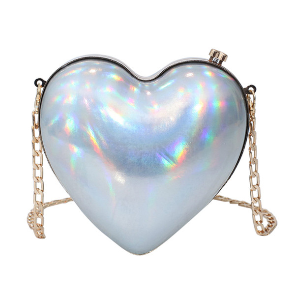 Geanta de dama moderna in forma de inima de culoare argintie