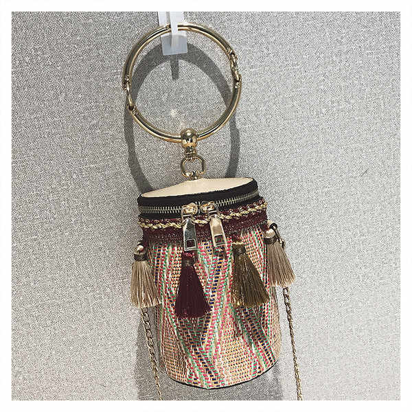 Modern női táska bojttal és fém fogantyúval, négy színben