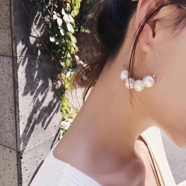 Aktuális női fülbevaló kerek forma gyöngyökkel