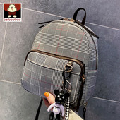Kockás női hátizsák kiegészítővel