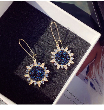 Elegáns női fülbevaló kék kövekkel