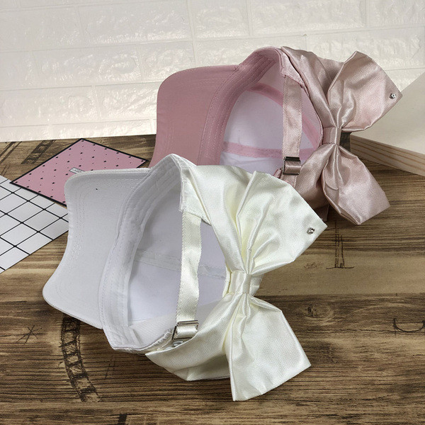 HIT Női sapka napellenzővel és szalaggal több színben