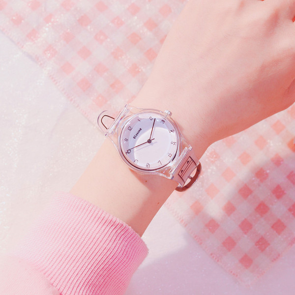 Σύγχρονο γυναικείο ρολόι με διαφανή λουράκι και βραχιόλι