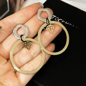 Modern női fülbevalók új modellje kerek formával