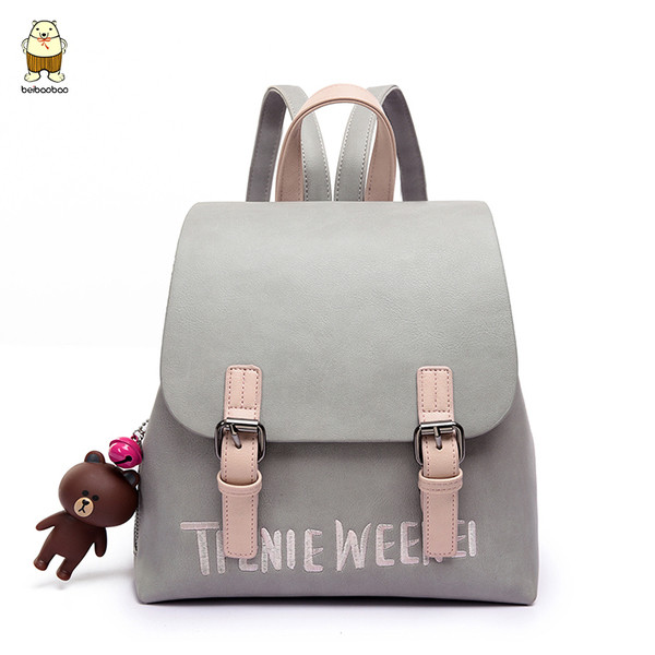 Μοντέρνο γυναικείο σακίδιο με αξεσουάρ σε ροζ, γκρι και μαύρο χρώμα