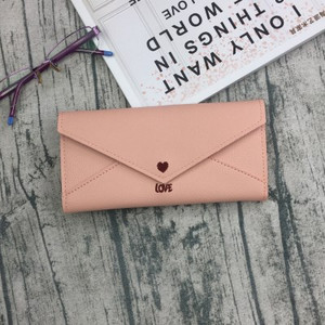 Μοντέρνο γυναικείο πορτοφόλι με κεντήματα σε διάφορα χρώματα