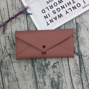 Μοντέρνο γυναικείο πορτοφόλι με κεντήματα σε διάφορα χρώματα