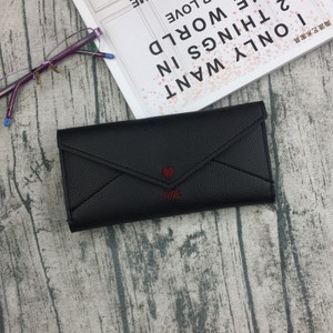 Μοντέρνο γυναικείο πορτοφόλι με κεντήματα σε διάφορα χρώματα