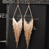 Κομψά μακρύ γυναικεία σκουλαρίκια  με μενταγιόν