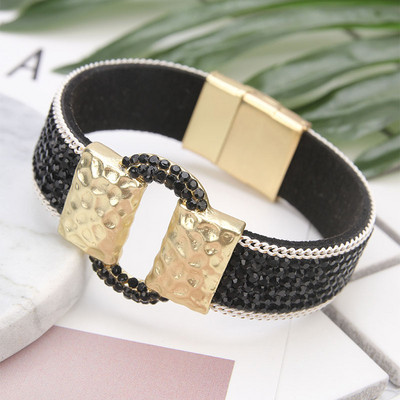 Elegáns női karkötő kövekkel több színben és fém csattal