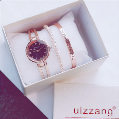 Stílusos női karóra fém láncokkal, valamint két karkötővel és egy dobozzal