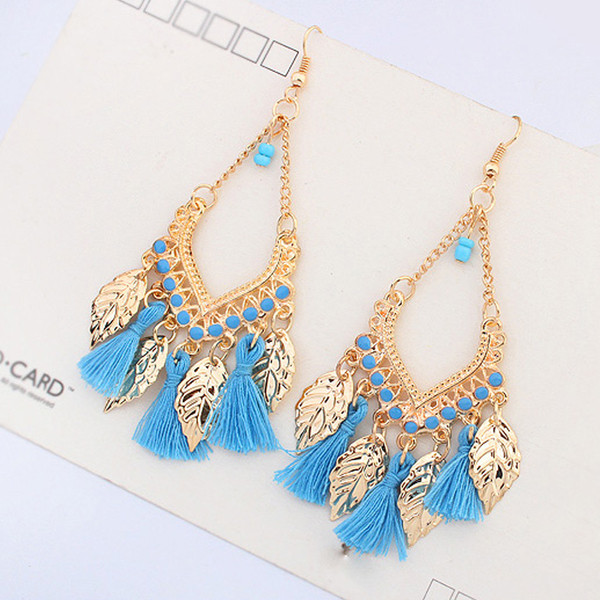 Μοντέρνα γυναικεία σκουλαρίκια με φούντα και μενταγιόν