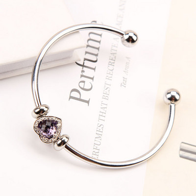 Stílusos női karkötő kövekkel több színben