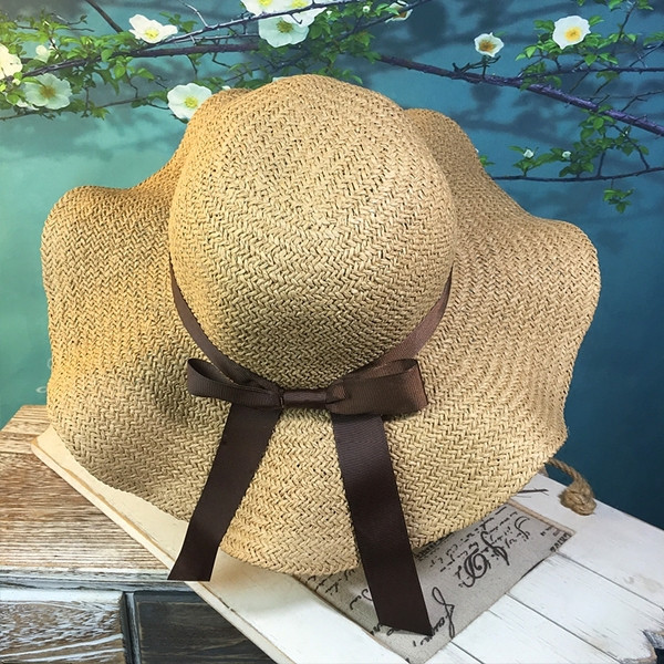 Stílusos női sapka szalaggal, négy színben