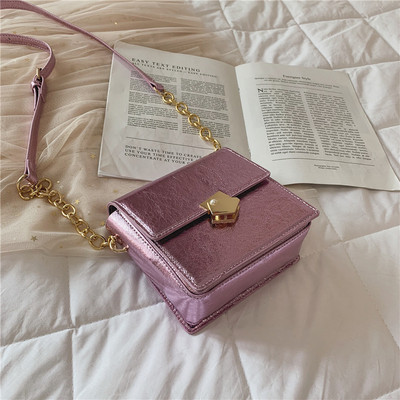 Stílusos női táska öko bőrből fehér és lila színben