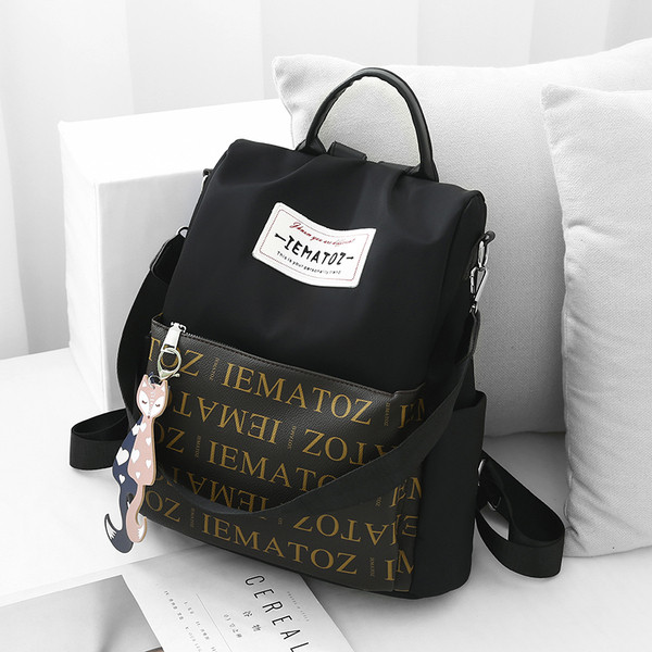 Hétköznapi női hátizsák piros és fekete színben