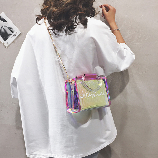 Κομψή γυναικεία τσάντα σε δύο χρώματα με μικρή και μακρά λαβή