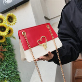 Eko bőrből készült stílusos női táska fém díszítéssel három színben