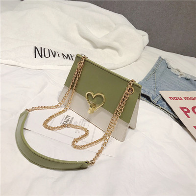 Eko bőrből készült stílusos női táska fém díszítéssel három színben