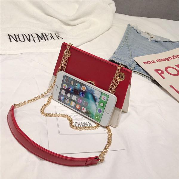 Eko bőrből készült stílusos női táska fém díszítéssel három színben