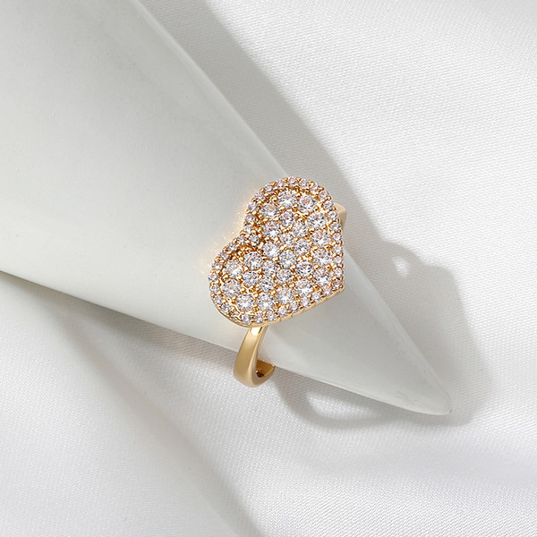 Állítható női gyűrű arany színben kövekkel