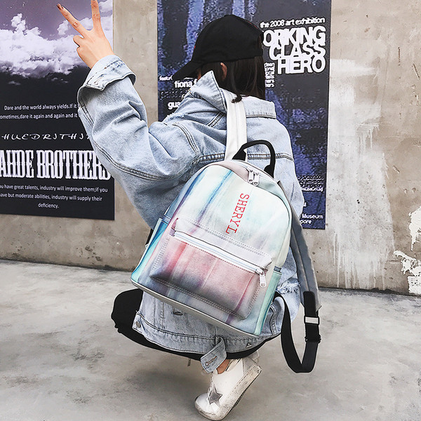 Rucsac modern de dama in culoare irizata cu buzunar frontal