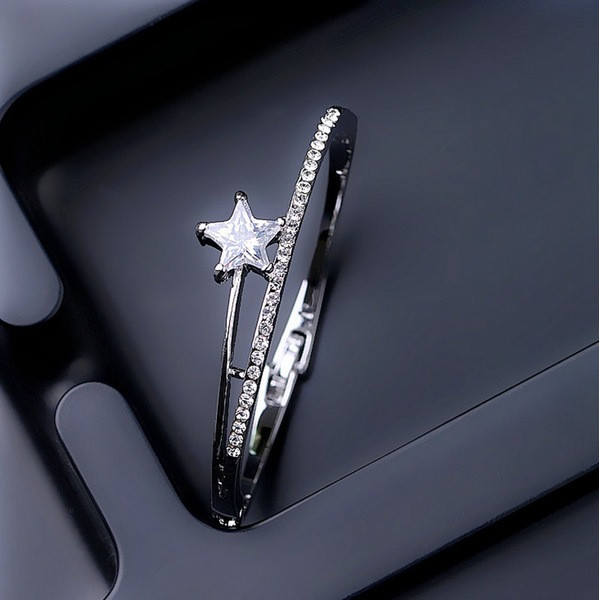 Γυναικείο βραχιόλι με ένα αστέρι σε δύο χρώματα