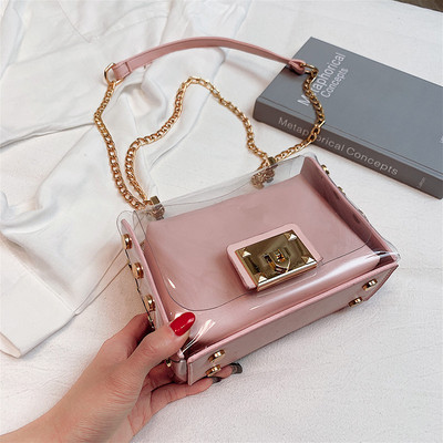 Stílusos női táska fém fogantyúval több színben