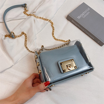 Stílusos női táska fém fogantyúval több színben