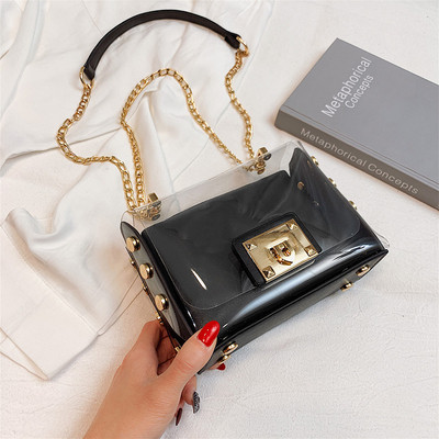 Stílusos női táska fém fogantyúval több színben