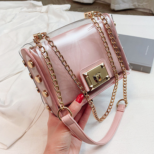 Stílusos női táska fém fogantyúval több színben