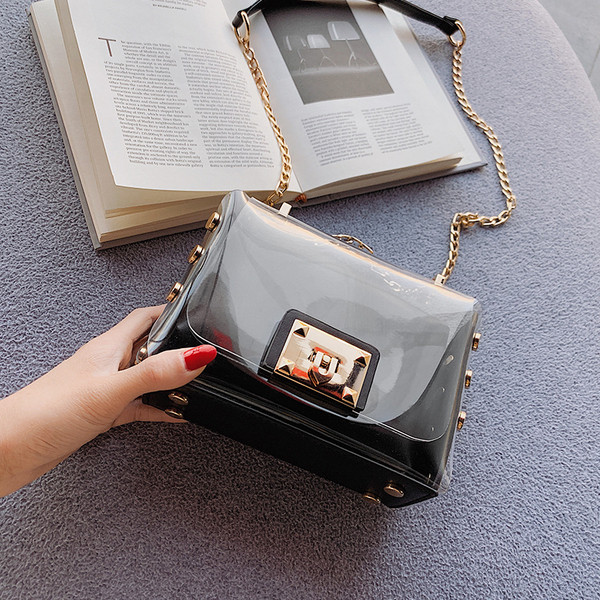 Stílusos női táska fém fogantyúval több színben