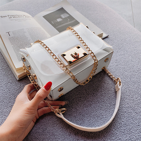 Stílusos női táska fém fogantyúval több színben