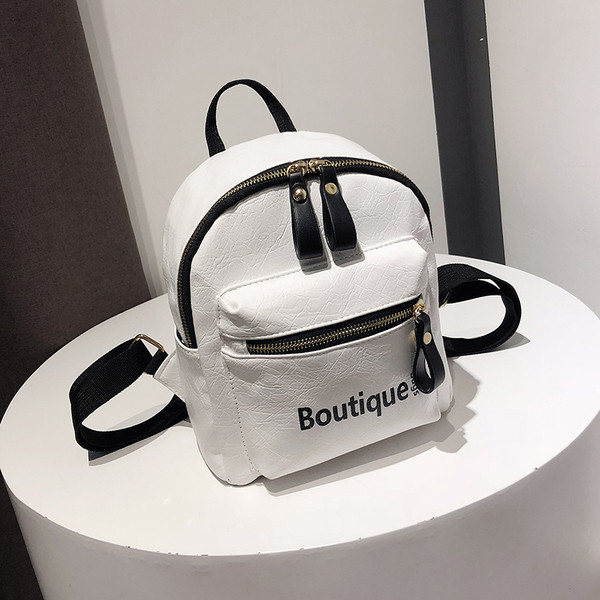 Modern női hátizsák fehér, barna és fekete színben