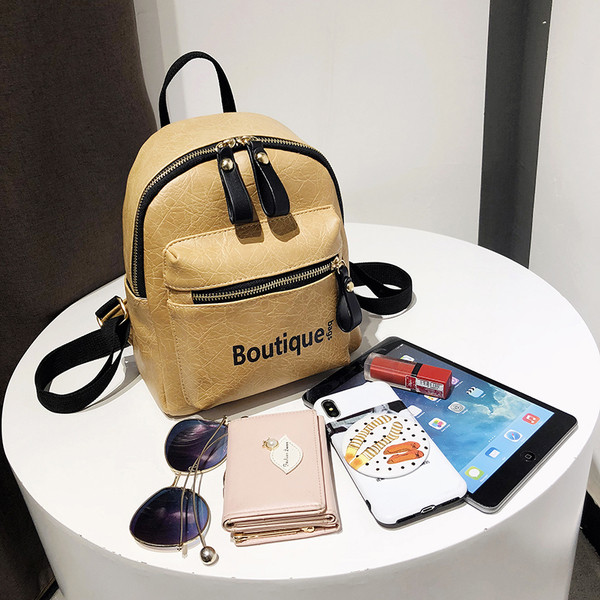 Modern női hátizsák fehér, barna és fekete színben