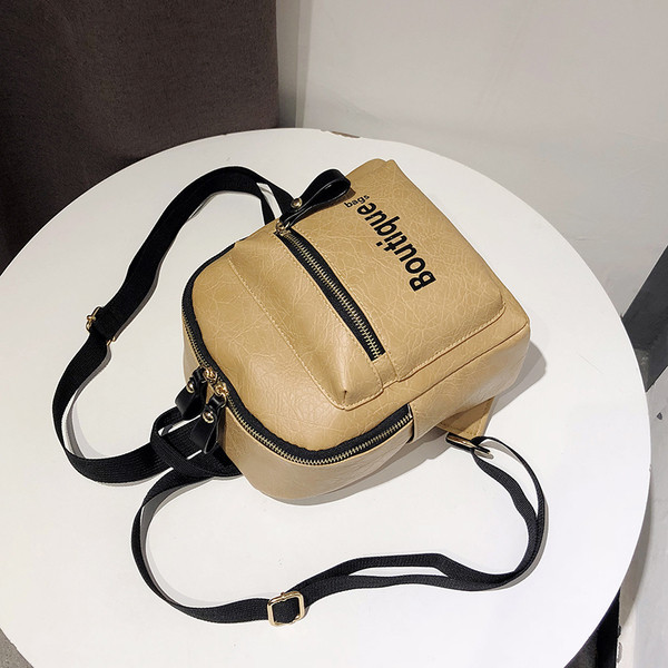 Modern női hátizsák fehér, barna és fekete színben