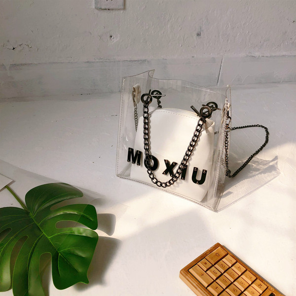 Aktuális női táska rövid és hosszú fém füllel, két színben