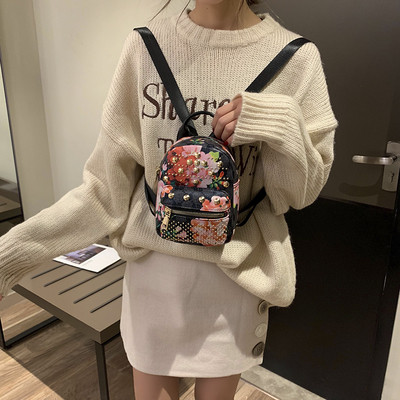 Stílusos női táska virágmintával