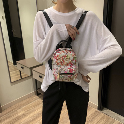 Stílusos női táska virágmintával