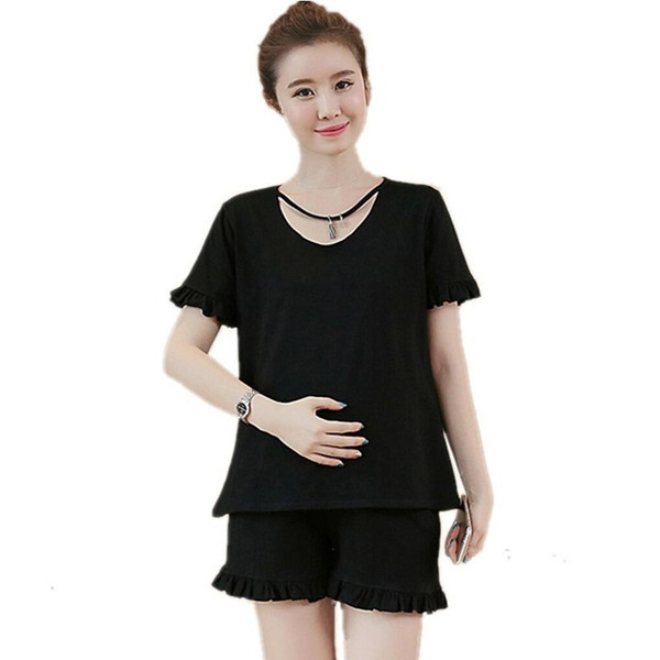 Σετ για έγκυες γυναίκες, συμπεριλαμβανομένων σορτς και μπλουζάκι σε μαύρο και ροζ χρώμα