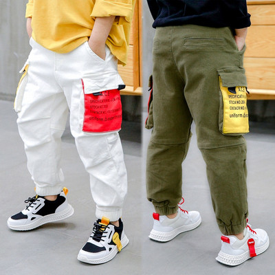 Стилни детски панталони в бял и кафяв цвят 