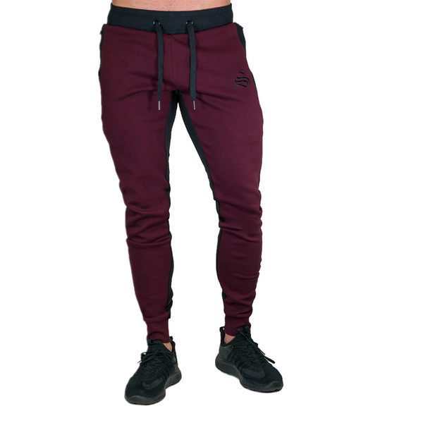 Férfi sportnadrág három színben, zsebekkel