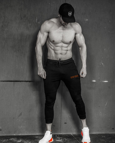 Pantaloni sport pentru bărbați în patru culori cu inscripție și cravate