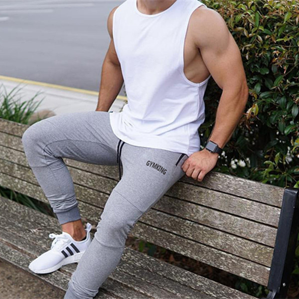 Pantaloni sport pentru bărbați în patru culori cu inscripție și cravate