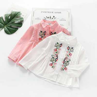 Modern children`s shirt for girls with embroidery in two colors